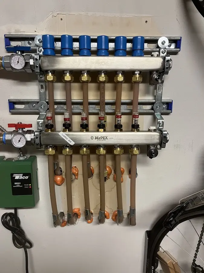 Plumber performing Gas Line Installation at a residential property in Baltimore